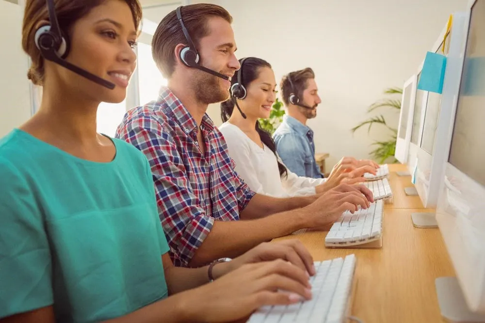 Call centre agents sharing customer insights